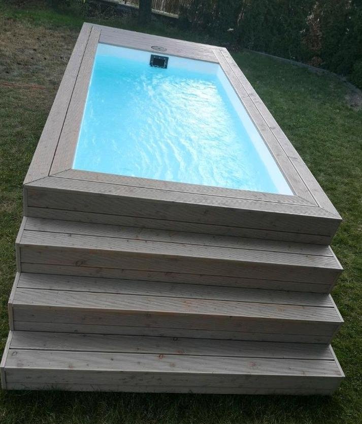 PISCINA CONTENEDOR CON REVESTIMIENTO DE MADERA - Imagen 2